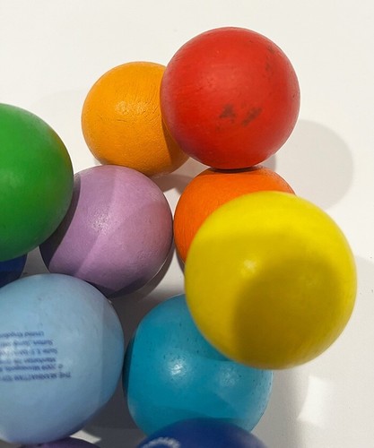 Manhattan Toy Company Wooden Balls Rainbow Colors Sensory Play Balls Fidget Toy - Picture 3 of 3