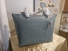 Beautiful Color Coach Signature Leather Zipper Tote with silver accents.
