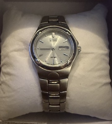 Citizen Eco-Drive Women s Titanium WR100 Blue Dial Day Date Watch E001-K17580