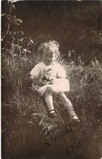 Cute Little Girl Sitting In A Chair Real Photo Postcard