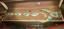 ornate silvertone metal necklace and bracelet costume jewellry