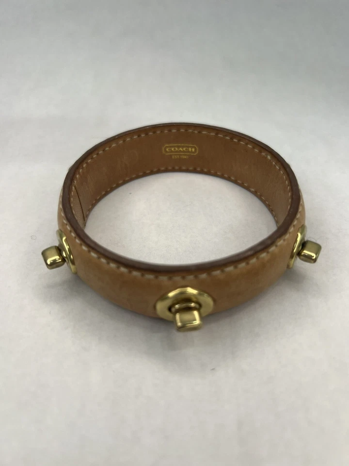 Auténtica pulsera de cuero Coach Turnlock Foto 2 de 4