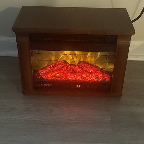 heat surge electric fireplace 1200W Model WM 18D. No Remote