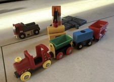 BRIO wooden Train And toy vehicles, including a crane,