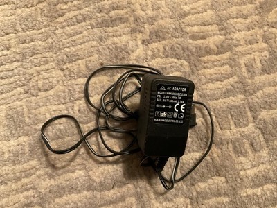 Netzteil Netzgerät AC Adapter HKA-0930EC-230A 9V 300mA