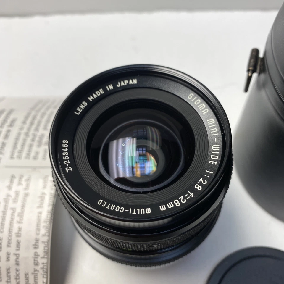 Sigma Mini-Wide Angle 28mm 1:2.8 f=28mm w/ Case And Manual - Image 2 of 4