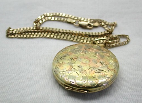9 Carat Gold Locket And Chain 