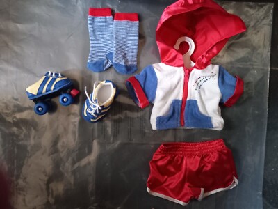 American girl Julie doll two sets in one roller skates and clothing, used