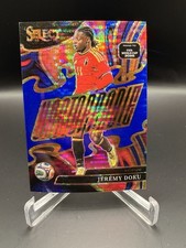 2025-26 Select Road to FIFA World Cup Jérémy Doku #21 Unstoppable Blue Pulsar