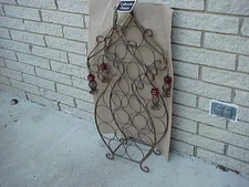 Two ( 2 ) Elegant Collezione standing metal wine racks hold 14 bottles each