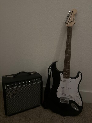 Fender Black electric guitar with amp and wires/ kit 