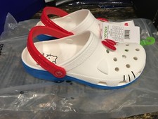 NEW Womens Crocs Hello Kitty Classic Clog Shoes, size 9 also mens size 7 