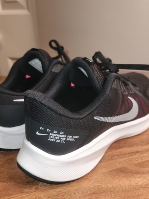 Nike Women's Quest 4 running shoes in black and pink. US Size 8