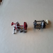 Two multiplier fishing reels for spares