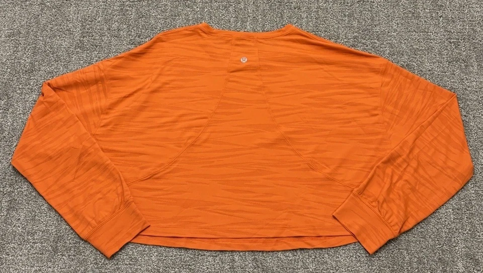 Camisa Lululemon Muscle Love Manga Larga Recortada Malla Tigre Cálida Coral Naranja Foto 2 de 4