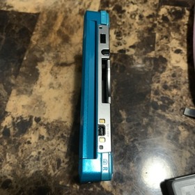 Nintendo 3DS Handheld System Aqua Blue 5 Games Charger 2GB Memory Card Case