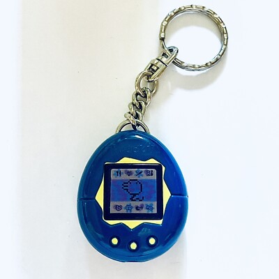 Vintage 1990s Tamagotchi Blue Keychain Bandai McDonalds 1997 Happy