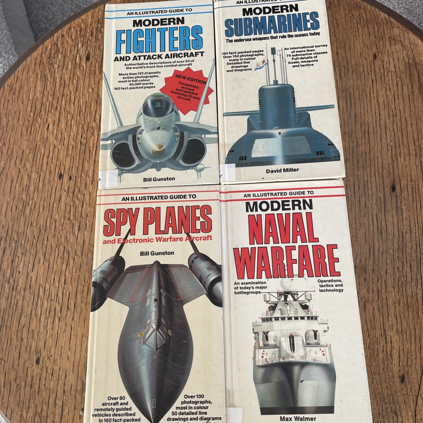 4 books on Modern War Machines, Spy Planes, Submarines, Naval Warfare, Fighters.