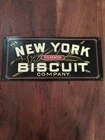 VINTAGE NEW YORK BISCUIT COMPANY FIG NEWTON PORCELAIN METAL