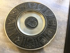 Vintage German pewter/zinn decorative wall plate featuring raised heraldic shiel