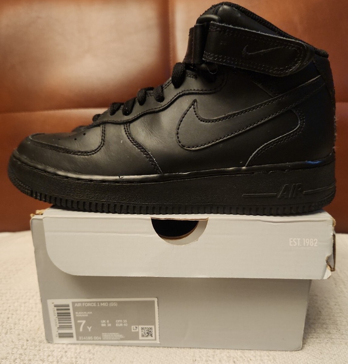 NIKE AIR FORCE 1 MID (GS) TRIPLE BLACK SNEAKER 314195-004  Nike Air Force 1 Mid Triple Black Shoe 314195-004 Men’s Size 7 / Womens Size 8.5 main image 0