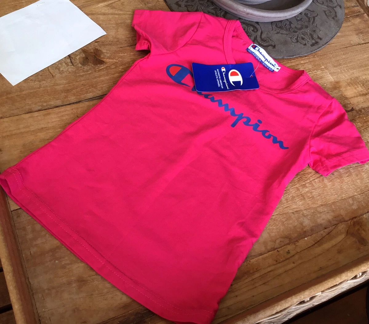Hot pink champion clearance shirt