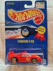 NIB Vintage Hot Wheels Blue Card Ferrari F40 Red w/gold chrome Wheels #69