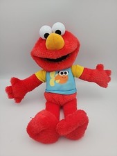 SESAME STREET 13-inch Sing-Along Plush Elmo with Lights and Sounds Works