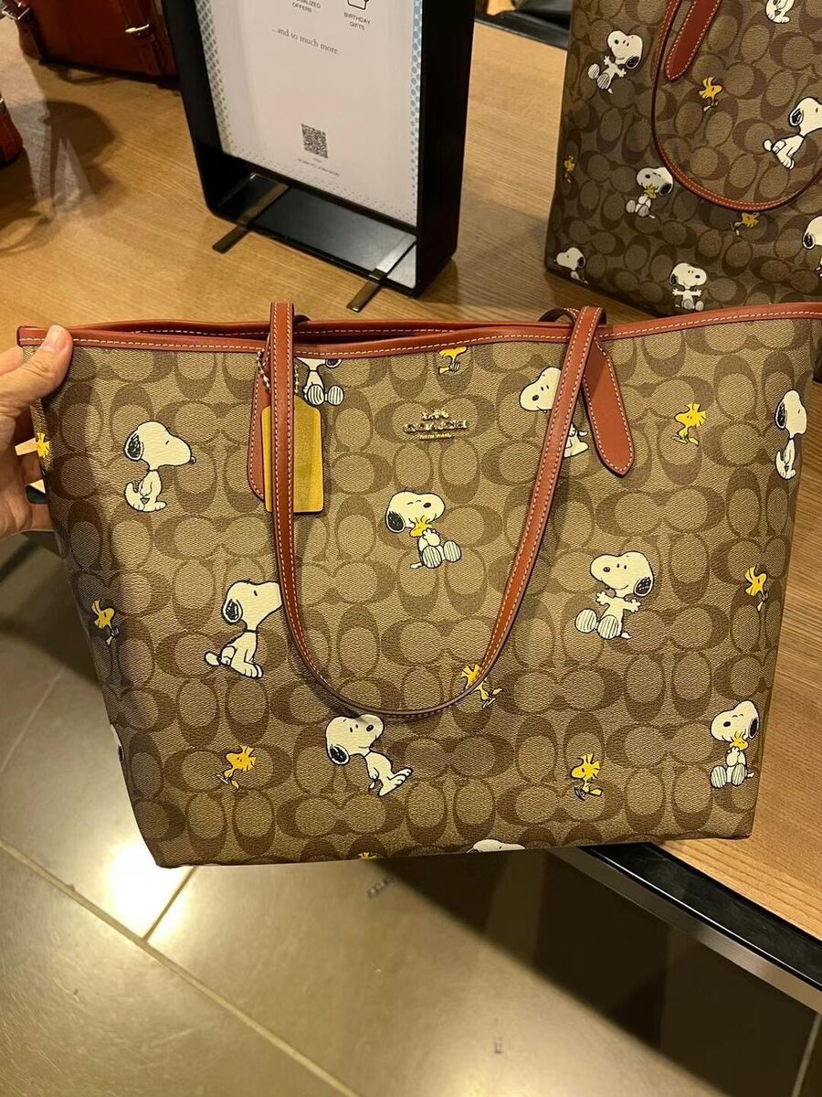 COACH®  Coach X Peanuts City Tote In Signature Canvas With Snoopy  Woodstock Print