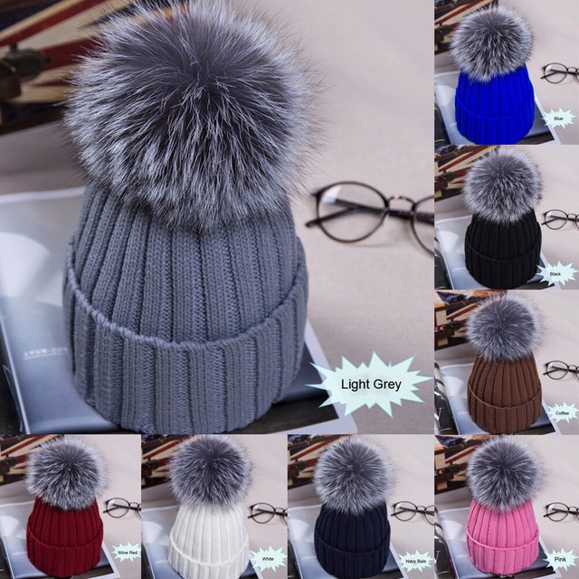 black hat brown bobble