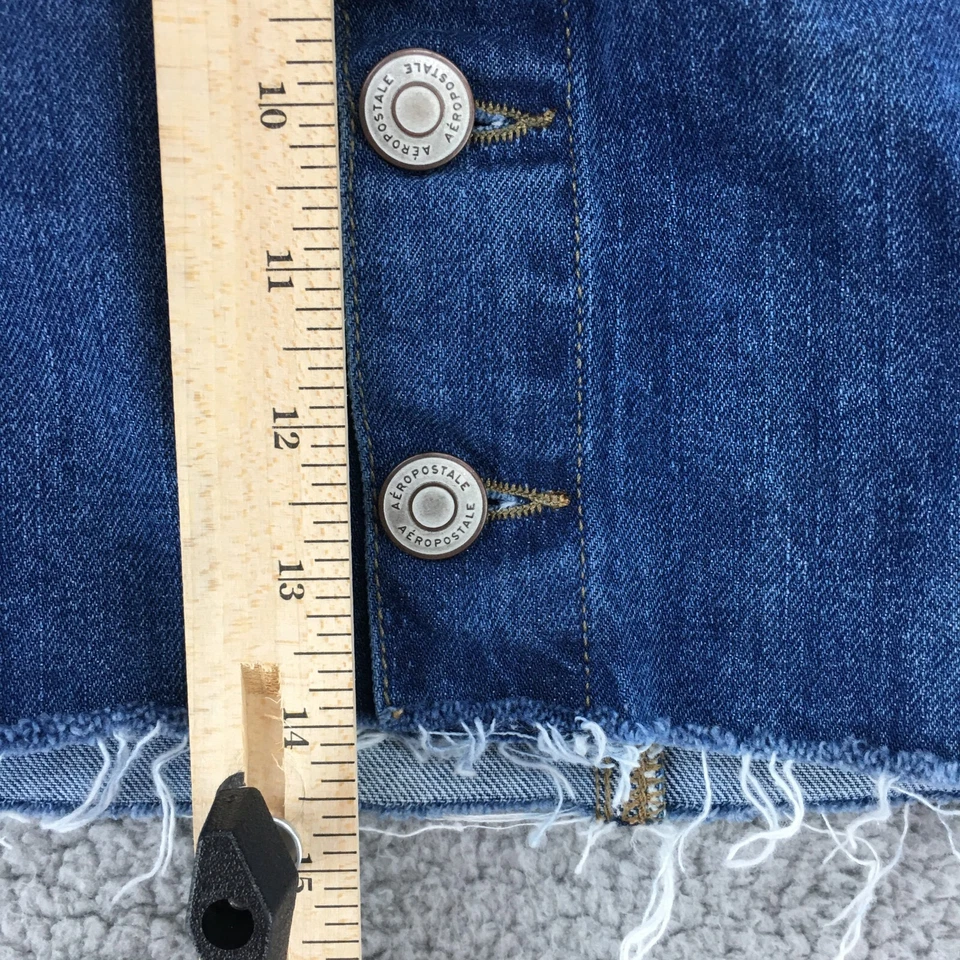 Minifalda Aero tiro alto botón mosca para mujer 8 azul denim lavado medio frente plano Foto 4 de 4