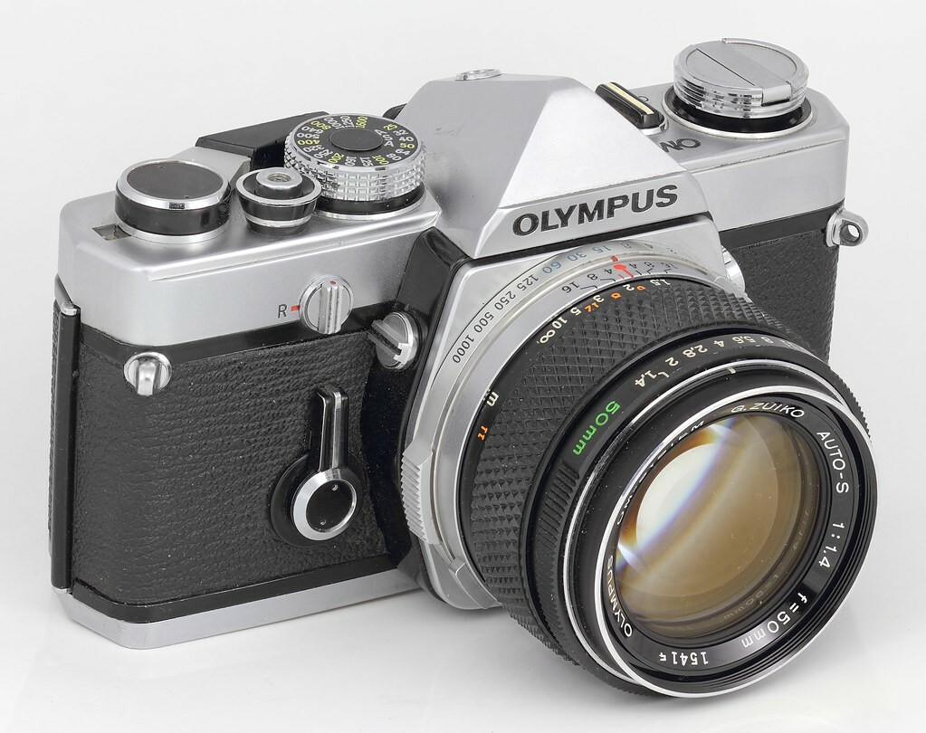 Olympus OM-1 35mm SLR Film Camera with 50 mm lens Kit 886610535480