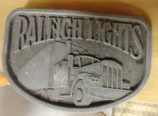 VINTAGE RALEIGH LIGHTS BELT BUCKLE SEMI TRUCK CIGARETTES