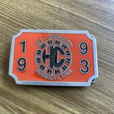 Hy Capacity Humboldt Iowa Belt Buckle Chrome Trim Red Black Enamel CD Hit 1993