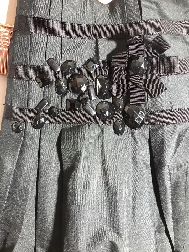 Falda plisada Robert Rodriguez para mujer talla 6 cinta adornada fiesta negra DEFECTUOSA Foto 4 de 4