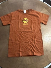 S28- Rust Moe’s Southwest Grill sz. Small (Adult) Feed The Moement T-shirt