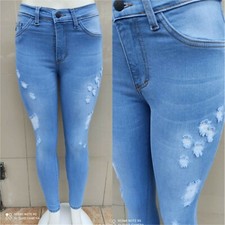 Womens pale blue stretch denim Family Jeans w/ artificial holes distressed