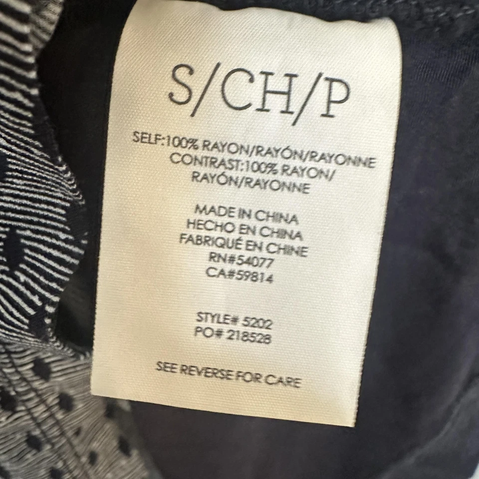 Camiseta sin mangas Cabi para mujer pequeña azul negro patrón alto bajo espalda deportiva rayón 5202 Foto 3 de 4