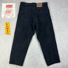 Vintage 90  s LEVI  S Orange Tab 550 Relaxed Fit Tapered Black Denim Jeans 32x25