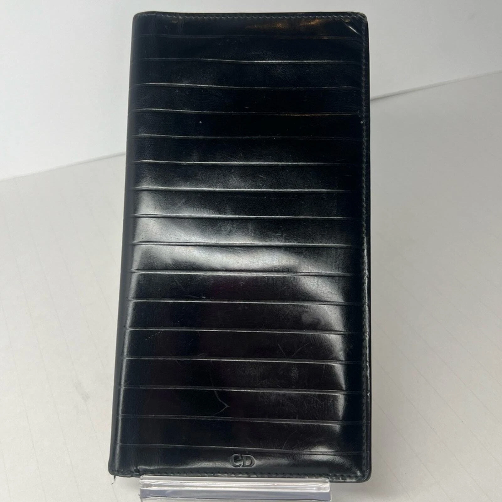 Christian Dior   Portefeuille long vintage noir double pli horizontal matelassé cuir ?