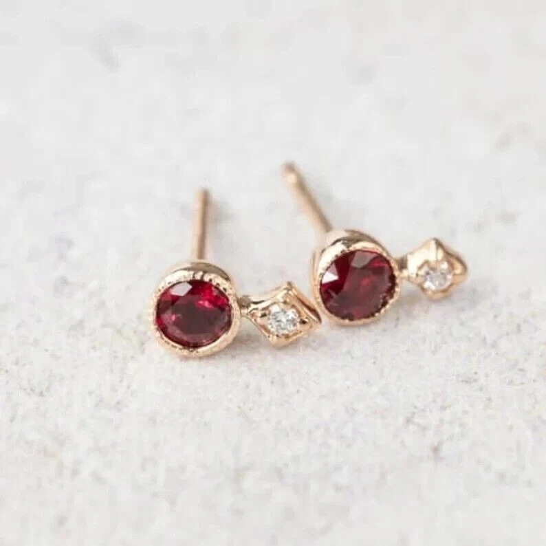 Shiny Simulated Round Red Ruby & Moissanite Women Stud Earrings In 10K Rose Gold - Image 3 of 4