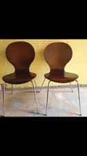 Pair of multilayered curved plywood Scandinavian style old chairs.