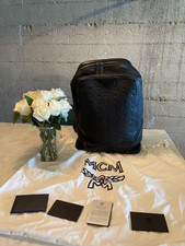 ottomar monogrammed leather backpack