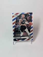 2024-25 Panini Prizm Red White Blue Damian Lillard Prizm Bucks #90