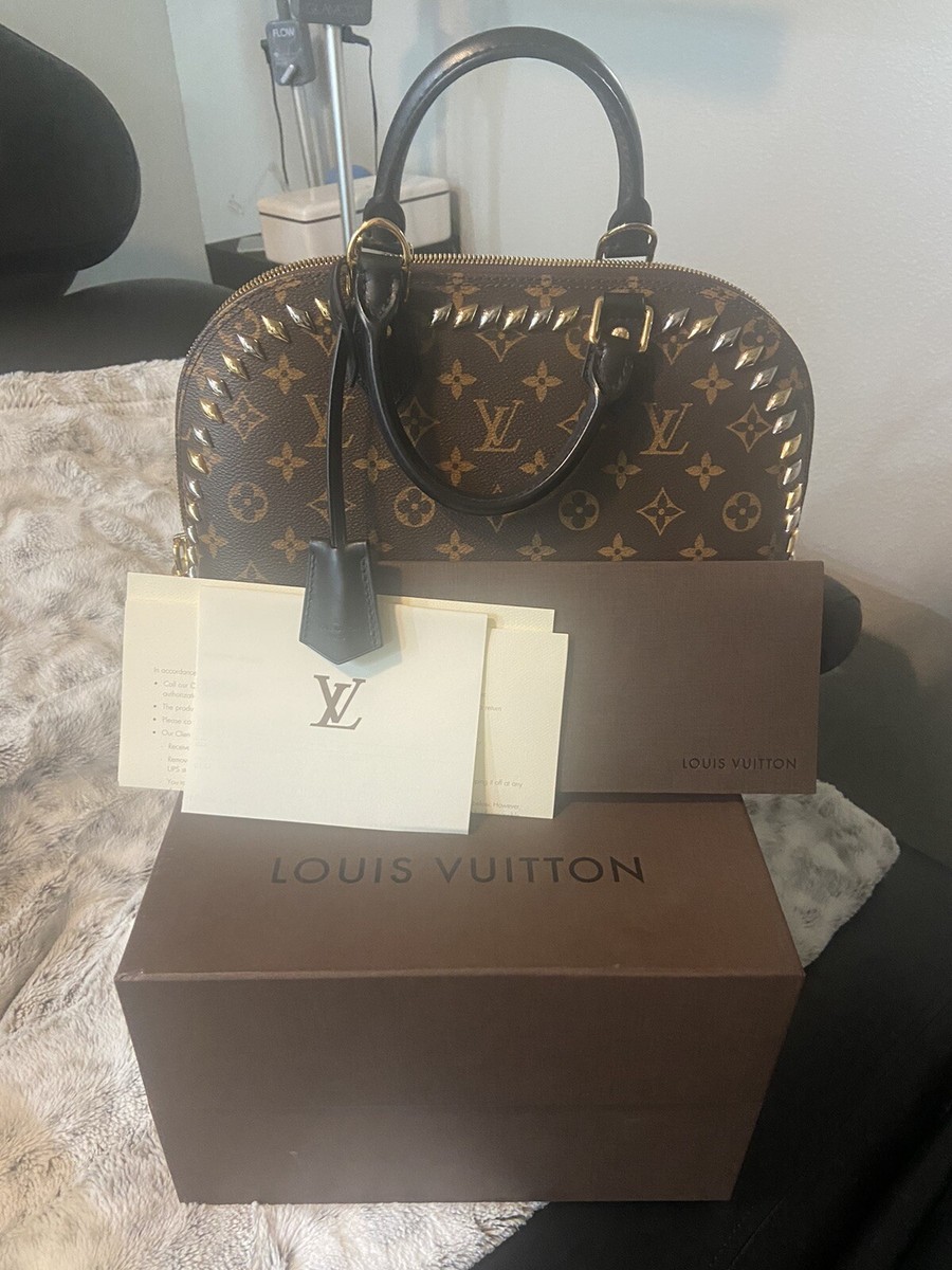 AUTHENTIC LOUIS VUITTON MONOGRAM ALMA PM STUDDED HANDBAG  display picture 1