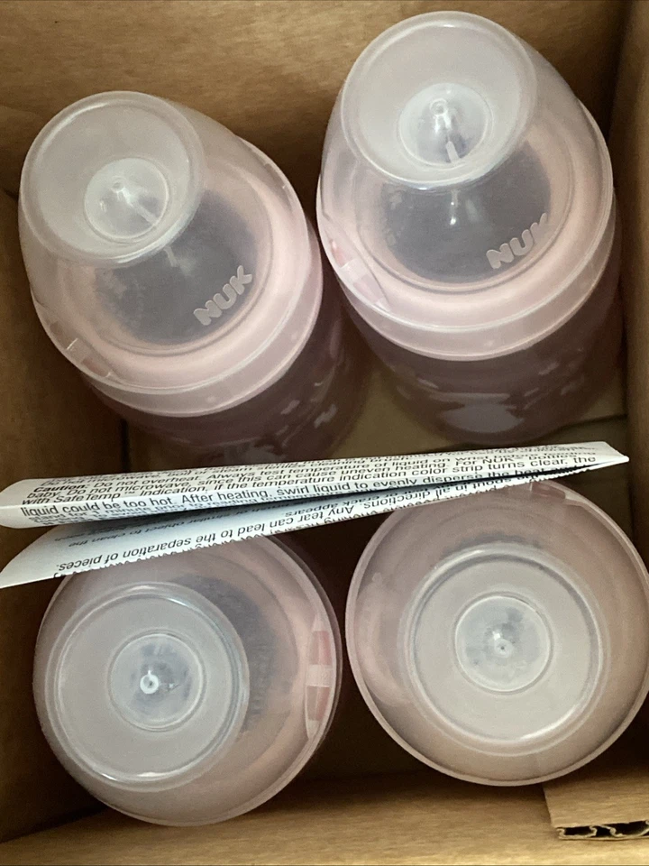 Biberón anticólicos de flujo suave NUK, 5 OZ, paquete de 4, conejo transparente Foto 2 de 4