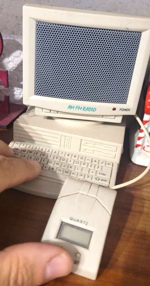 A 90s mini PC-shaped FM radio — the kind of delightfully absurd novelty that belongs on every tech nerd's desk as both a joke and a genuine conversation piece.