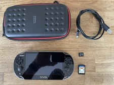 PlayStation Vita OLED - Case - 4GB Memory Card - Rayman Origins
