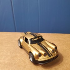 Tyco HP7 Lighted Gold  Black Porsche Turbo Carrera 911 HO Slot Car