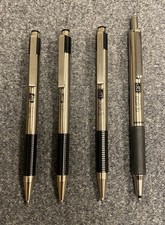 Four Zebra Stainless Steel Pens; 3 Ballpoints And One Gel Pen
